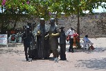 Statue of San Pedro Claver with mime's on both sides